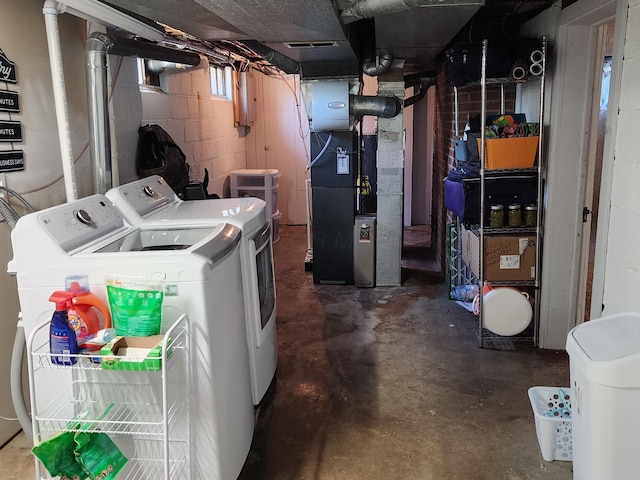 850 Grafton Rd, Newark, OH 43055 - laundry room with separate washer and dryer and heating unit