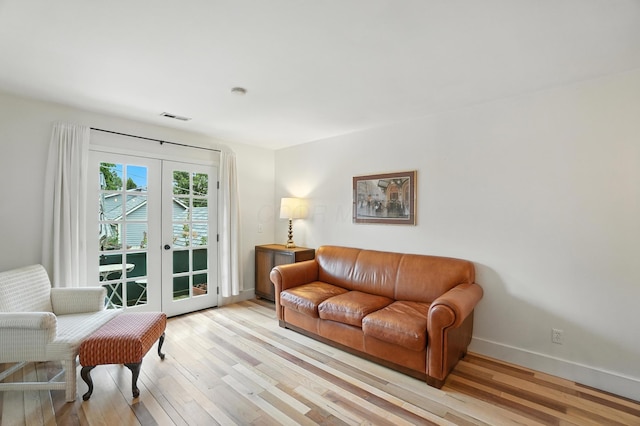 253 Kossuth St Unit H, Columbus, OH 43223 - living area with french doors and light wood finished floors