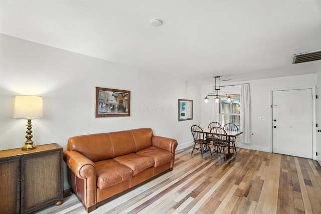 253 Kossuth St Unit H, Columbus, OH 43223 - living room featuring light wood-style floors and baseboards