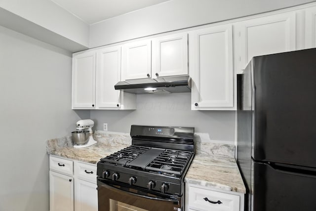 253 Kossuth St Unit H, Columbus, OH 43223 - kitchen featuring black appliances, under cabinet range hood, white cabinets, and light stone counters