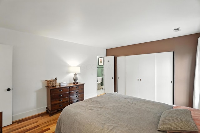 253 Kossuth St Unit H, Columbus, OH 43223 - bedroom featuring light wood finished floors and a closet