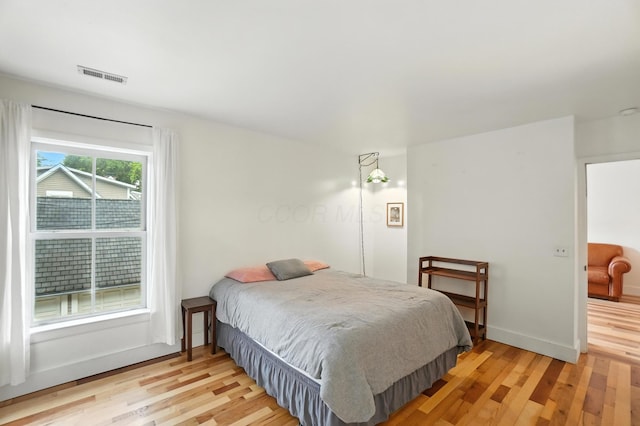 253 Kossuth St Unit H, Columbus, OH 43223 - bedroom with light wood finished floors and baseboards