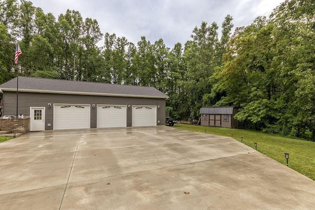 19366 Laurel Run Rd, Nelsonville, OH 45764 - garage with view of scattered trees and driveway