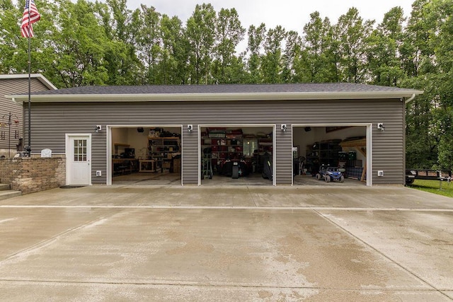 19366 Laurel Run Rd, Nelsonville, OH 45764 - garage with concrete driveway