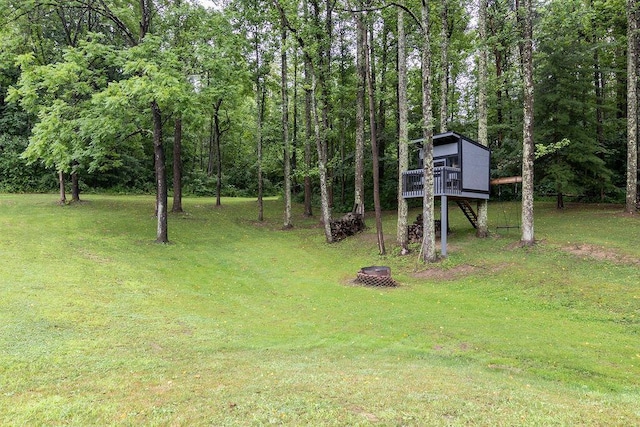 19366 Laurel Run Rd, Nelsonville, OH 45764 - view of grassy yard with stairs and a deck