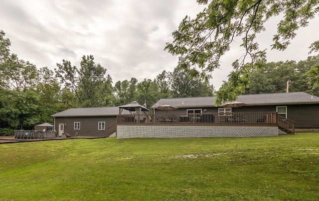 19366 Laurel Run Rd, Nelsonville, OH 45764 - rear view of house featuring a wooden deck, stairway, and a yard