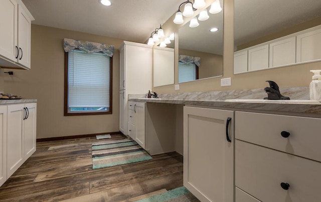 19366 Laurel Run Rd, Nelsonville, OH 45764 - bathroom with vanity, wood finished floors, and recessed lighting