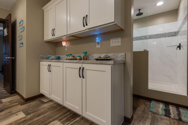 19366 Laurel Run Rd, Nelsonville, OH 45764 - kitchen featuring dark wood finished floors and white cabinetry