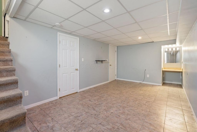 99 Maple Ave, Chillicothe, OH 45601 - finished basement featuring stairs, a paneled ceiling, and recessed lighting