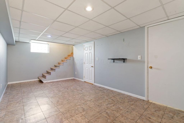 99 Maple Ave, Chillicothe, OH 45601 - basement featuring a paneled ceiling, stairway, and recessed lighting