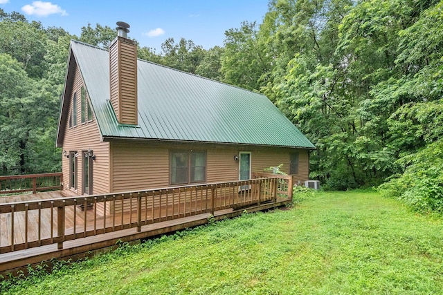 3857 US Highway 23, Chillicothe, OH 45601 - view of property exterior with a chimney, a lawn, a deck, and a metal roof