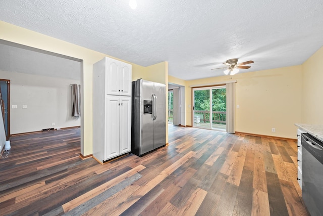 3857 US Highway 23, Chillicothe, OH 45601 - kitchen with stainless steel appliances, wood finished floors, white cabinetry, a ceiling fan, and a textured ceiling