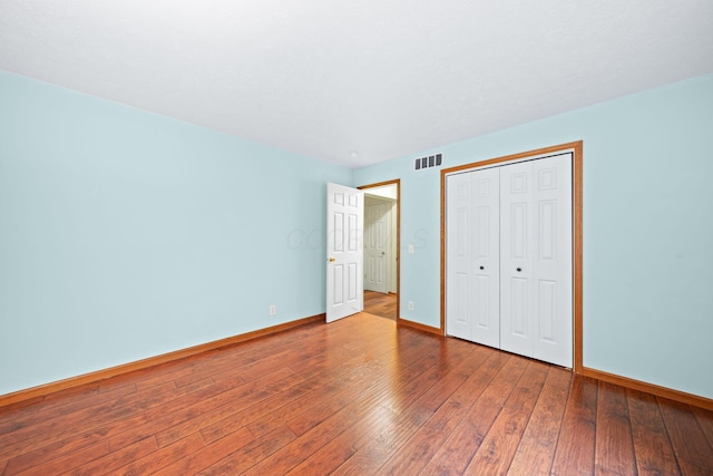 3857 US Highway 23, Chillicothe, OH 45601 - unfurnished bedroom with wood-type flooring and a closet