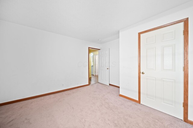3857 US Highway 23, Chillicothe, OH 45601 - unfurnished bedroom featuring carpet floors and baseboards