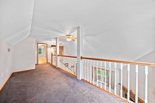 3857 US Highway 23, Chillicothe, OH 45601 - unfurnished room featuring vaulted ceiling, a textured ceiling, ceiling fan, and carpet floors
