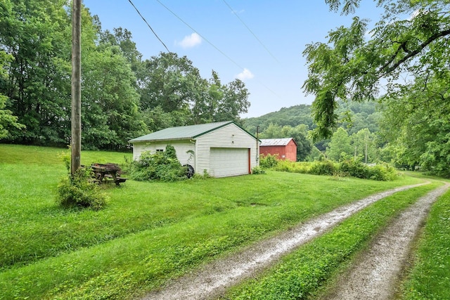 3857 US Highway 23, Chillicothe, OH 45601 - view of grassy yard featuring an outbuilding