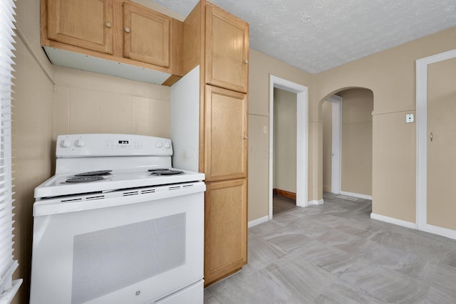 898-900 Berkeley Rd, Columbus, OH 43206 - kitchen featuring electric range, arched walkways, and a textured ceiling
