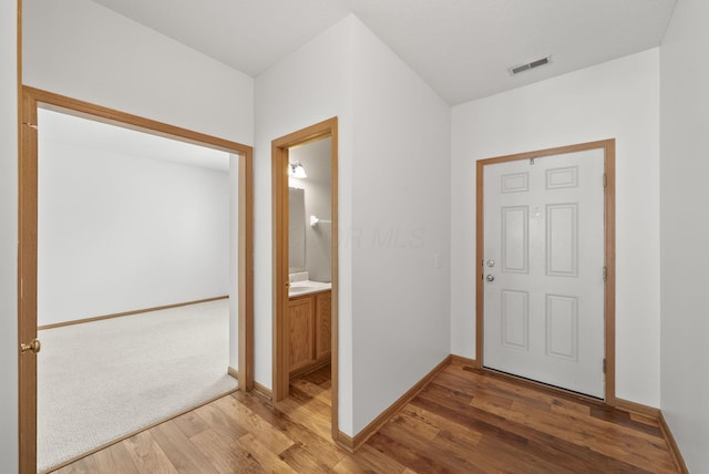 3734 Gibbstone Dr, Columbus, OH 43204 - foyer featuring wood finished floors and baseboards