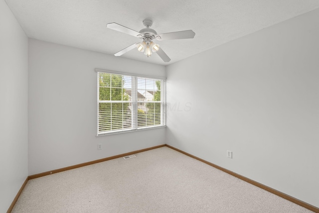 3734 Gibbstone Dr, Columbus, OH 43204 - carpeted empty room with baseboards and ceiling fan