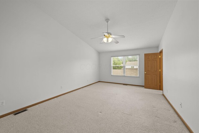 3734 Gibbstone Dr, Columbus, OH 43204 - empty room featuring a ceiling fan, light carpet, and vaulted ceiling