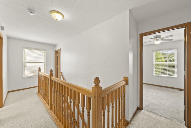 3734 Gibbstone Dr, Columbus, OH 43204 - corridor featuring an upstairs landing and light colored carpet