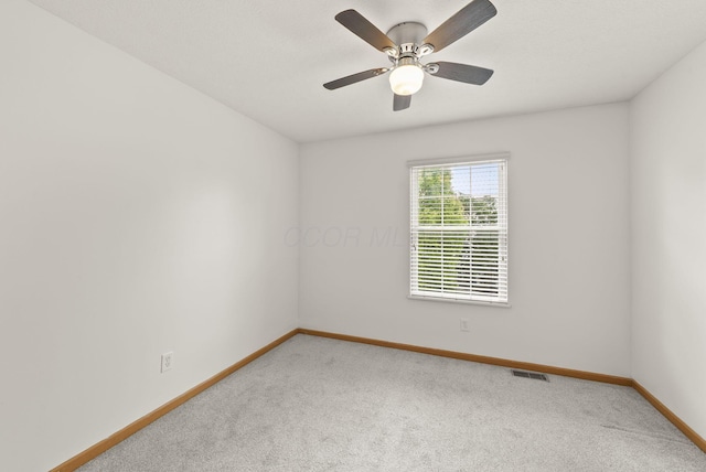 3734 Gibbstone Dr, Columbus, OH 43204 - carpeted empty room with baseboards and a ceiling fan