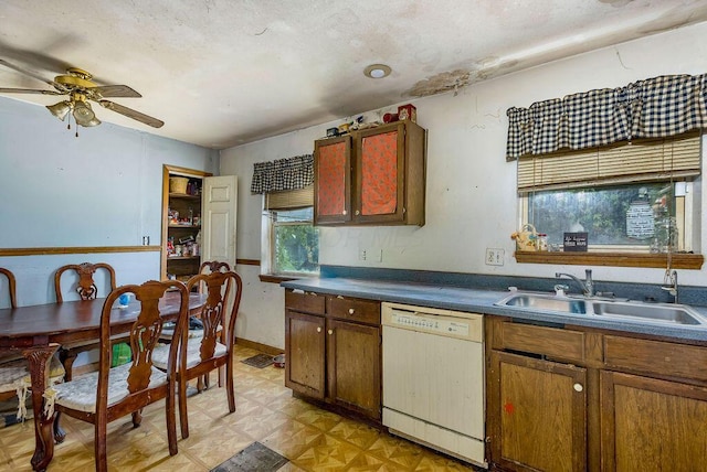 4747 Basil Ln, Cincinnati, OH 45238 - kitchen featuring white dishwasher, a ceiling fan, dark countertops, and light flooring