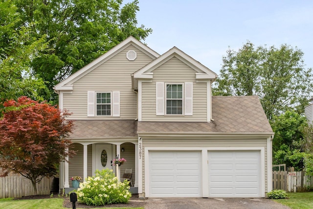 2387 Sutter Pkwy, Dublin, OH 43016 - traditional-style home with a porch and asphalt driveway