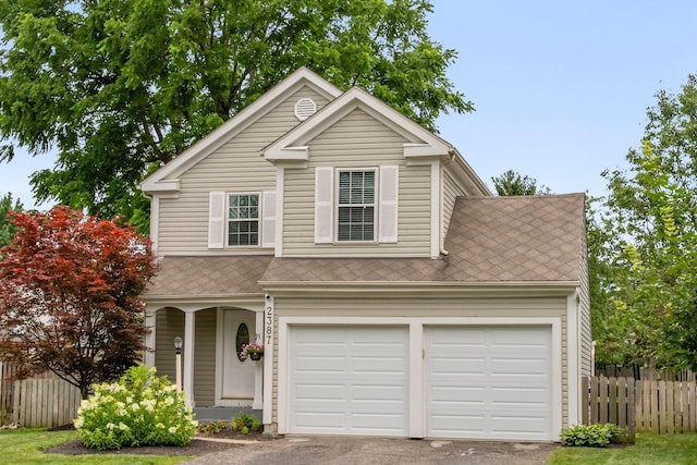 2387 Sutter Pkwy, Dublin, OH 43016 - traditional-style house featuring asphalt driveway and covered porch