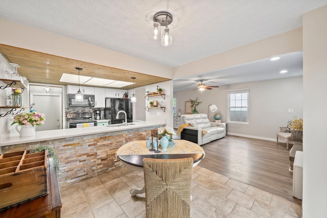 2387 Sutter Pkwy, Dublin, OH 43016 - dining room featuring ceiling fan and recessed lighting