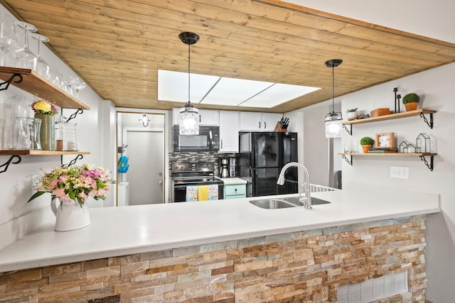 2387 Sutter Pkwy, Dublin, OH 43016 - kitchen with open shelves, black appliances, wooden ceiling, a peninsula, and pendant lighting