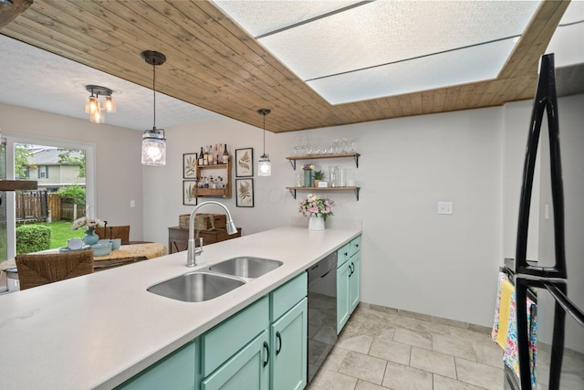 2387 Sutter Pkwy, Dublin, OH 43016 - kitchen with freestanding refrigerator, dishwasher, green cabinets, and light countertops