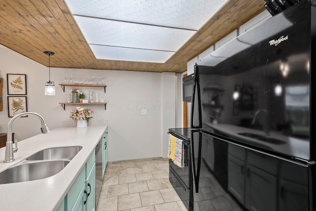 2387 Sutter Pkwy, Dublin, OH 43016 - kitchen featuring light countertops, open shelves, black appliances, a skylight, and pendant lighting