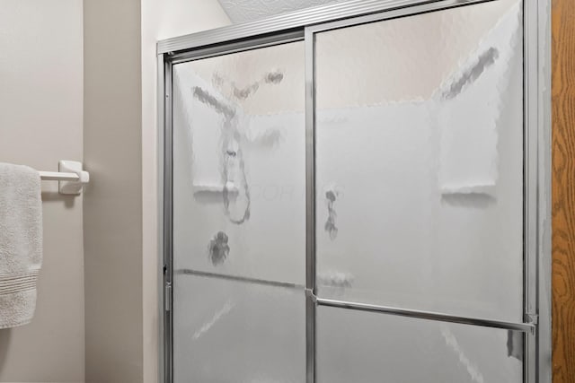2387 Sutter Pkwy, Dublin, OH 43016 - bathroom featuring a shower with shower door