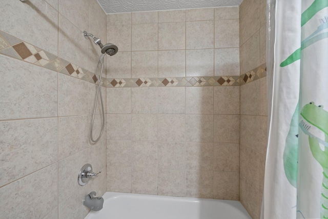 2387 Sutter Pkwy, Dublin, OH 43016 - bathroom with shower / bathtub combination with curtain