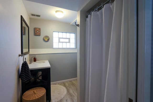 5081 Mengel Ln, Hilliard, OH 43026 - bathroom featuring wood finished floors and vanity