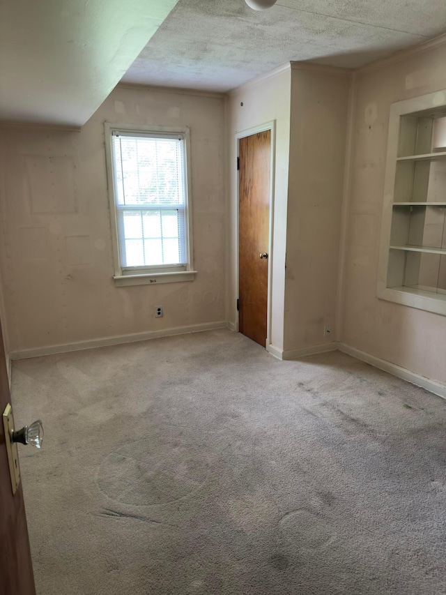 3660 Watt Rd, Columbus, OH 43230 - carpeted empty room with a textured ceiling