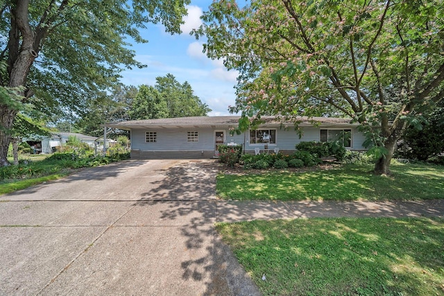 3750 Dresden St, Columbus, OH 43224 - ranch-style home with driveway and a front lawn
