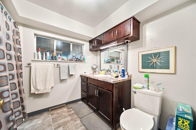 3750 Dresden St, Columbus, OH 43224 - bathroom with vanity and wood finished floors