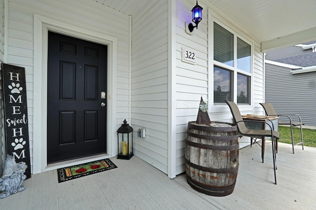 322 Honeysuckle St, South Bloomfield, OH 43103 - property entrance featuring covered porch