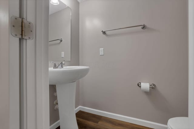 5512 Old Coble St, Canal Winchester, OH 43110 - bathroom featuring baseboards and wood finished floors