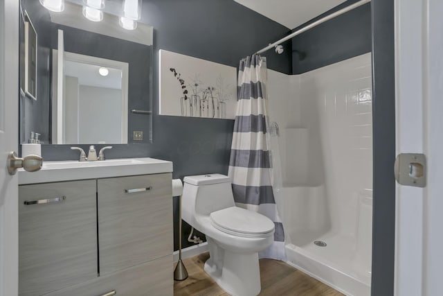 5512 Old Coble St, Canal Winchester, OH 43110 - full bathroom with wood finished floors, vanity, and a shower with shower curtain