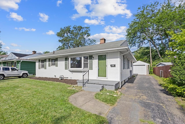 3851 Security Dr, Grove City, OH 43123 - view of front facade with a garage, a chimney, and an outdoor structure