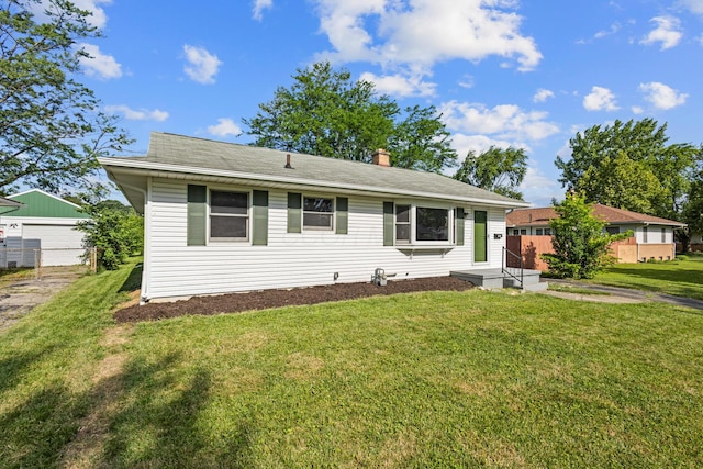 3851 Security Dr, Grove City, OH 43123 - ranch-style house with a chimney and a detached garage