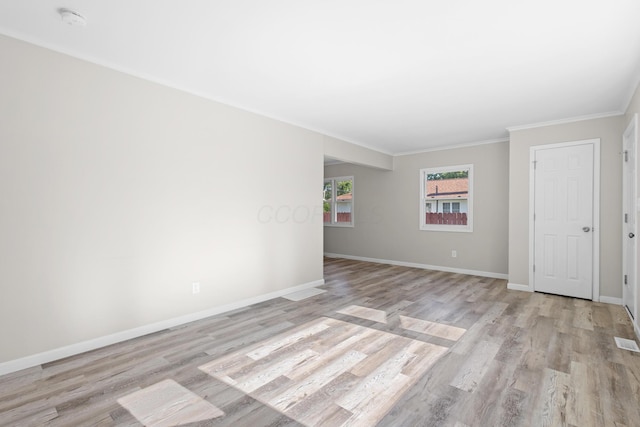 3851 Security Dr, Grove City, OH 43123 - unfurnished room with light wood-style floors, a smoke detector, and crown molding