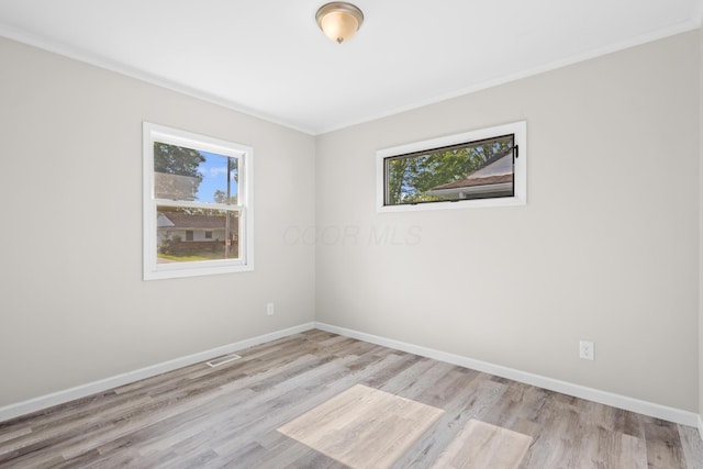 3851 Security Dr, Grove City, OH 43123 - empty room featuring wood finished floors and ornamental molding