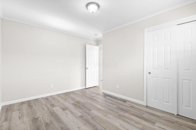 3851 Security Dr, Grove City, OH 43123 - unfurnished bedroom with light wood-style flooring and ornamental molding