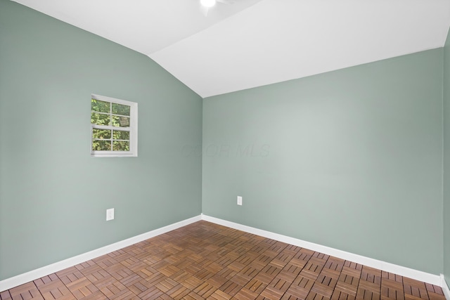 3851 Security Dr, Grove City, OH 43123 - spare room featuring baseboards and vaulted ceiling