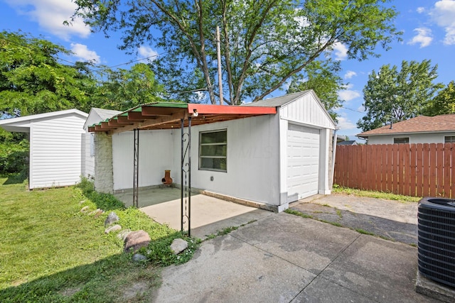 3851 Security Dr, Grove City, OH 43123 - rear view of property with driveway and a patio area