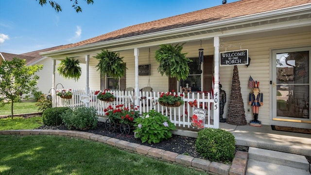 405 Meadowland Dr, Newark, OH 43055 - doorway to property featuring covered porch and roof with shingles